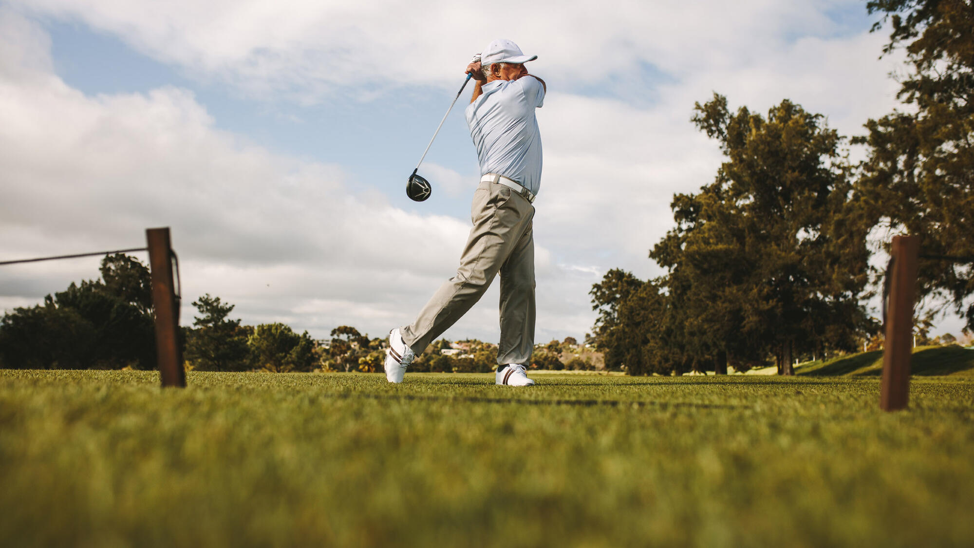 Man swinging golf club